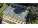 Aerial view of a tennis and pickleball court at 38633 Lakeview Walk, Lady Lake, FL 32159