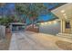 Private backyard with a detached garage and wooden fence at 413 W Princeton St, Orlando, FL 32804