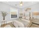 Bright bedroom with a ceiling fan and plenty of natural light at 413 W Princeton St, Orlando, FL 32804