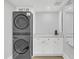 Modern laundry room with stackable LG washer and dryer at 413 W Princeton St, Orlando, FL 32804