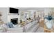 Cozy living room featuring a fireplace and open concept layout at 413 W Princeton St, Orlando, FL 32804