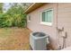 View of the home's central AC unit at 525 S Lakemont Ave, Winter Park, FL 32792