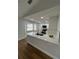 Updated kitchen featuring white shaker cabinets and quartz countertops at 581 Calusa Ter, Deltona, FL 32738