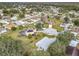 Aerial view showing the house and neighborhood at 604 Elfrida Way, Kissimmee, FL 34758