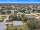 Aerial view showing the house and surrounding neighborhood at 604 Elfrida Way, Kissimmee, FL 34758