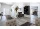 Bright and spacious entryway with wood-look floors and stylish decor at 604 Elfrida Way, Kissimmee, FL 34758