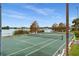 Well-maintained tennis court with lake view at 620 Orange Dr # 228, Altamonte Springs, FL 32701