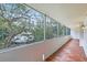 Spacious screened balcony with scenic wooded views at 690 Osceola Ave # 209, Winter Park, FL 32789