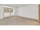 Large bedroom with wall-to-wall carpeting and access to balcony at 690 Osceola Ave # 209, Winter Park, FL 32789