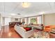 Spacious community room with comfortable seating and dining area at 690 Osceola Ave # 209, Winter Park, FL 32789