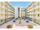Inviting courtyard with seating areas in the Lake Virginia community at 690 Osceola Ave # 209, Winter Park, FL 32789