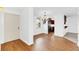 Bright dining room with hardwood floors and chandelier at 690 Osceola Ave # 209, Winter Park, FL 32789