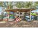 Outdoor Kayak storage area with covered racks at 690 Osceola Ave # 209, Winter Park, FL 32789