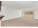 Spacious living room with carpet and access to a balcony at 690 Osceola Ave # 209, Winter Park, FL 32789