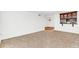 Living room with hardwood and carpeted floors, and a chandelier at 690 Osceola Ave # 209, Winter Park, FL 32789