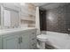 Updated bathroom with a large walk-in shower and modern vanity at 734 E Michigan St # 113, Orlando, FL 32806