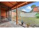Screened patio with backyard access and wooden ceiling at 734 E Michigan St # 113, Orlando, FL 32806