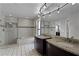 Elegant bathroom with granite double vanity and large shower at 783 Tomlinson Ter, Lake Mary, FL 32746