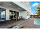 Outdoor patio with seating, pool, and cornhole at 8137 Surf St, Kissimmee, FL 34747