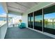 Spacious balcony with sliding doors and lake views at 8137 Surf St, Kissimmee, FL 34747