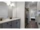 Modern bathroom with double vanity and walk-in shower at 8137 Surf St, Kissimmee, FL 34747