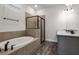 Spa-like bathroom with a soaking tub and a separate shower at 8137 Surf St, Kissimmee, FL 34747