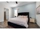 Serene bedroom with a plush bed and tranquil decor at 8137 Surf St, Kissimmee, FL 34747