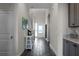 Bright entryway with tile floors and a small table at 8137 Surf St, Kissimmee, FL 34747