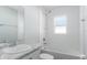 Clean bathroom with a bathtub, shower, and vanity at 878 Galloway St, Lake Alfred, FL 33850