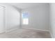 Spacious bedroom featuring neutral walls and carpeted floors at 878 Galloway St, Lake Alfred, FL 33850
