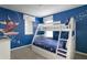 bedroom with a bunk bed and Mickey Mouse decor at 9009 Rhodes St, Kissimmee, FL 34747