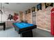 Game room with pool table and Harry Potter theme at 9009 Rhodes St, Kissimmee, FL 34747
