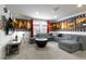 Home theater with sectional sofa and movie-themed wall decor at 9009 Rhodes St, Kissimmee, FL 34747