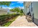 Private backyard patio with seating and basketball hoop at 931 Kylee Aly, Winter Garden, FL 34787