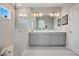 Elegant bathroom with double vanity and large shower at 931 Kylee Aly, Winter Garden, FL 34787