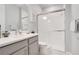 Clean bathroom with gray vanity and walk-in shower at 931 Kylee Aly, Winter Garden, FL 34787