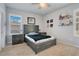 Comfortable bedroom with a double bed and plenty of storage at 931 Kylee Aly, Winter Garden, FL 34787