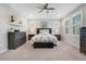 Serene bedroom with a queen bed and ample space at 931 Kylee Aly, Winter Garden, FL 34787