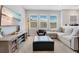 Comfortable bonus room with sectional sofa and large TV at 931 Kylee Aly, Winter Garden, FL 34787
