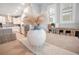 Bright dining area with a large table and stylish decor at 931 Kylee Aly, Winter Garden, FL 34787
