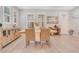 Dining room with wooden table, sideboard and neutral decor at 931 Kylee Aly, Winter Garden, FL 34787