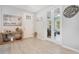 Bright and airy entryway with glass french doors at 931 Kylee Aly, Winter Garden, FL 34787