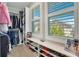 Spacious walk-in closet with built-in shelving and shoe storage at 931 Kylee Aly, Winter Garden, FL 34787