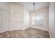 Simple dining area with tile flooring and large window at 10050 Hidden Dunes Ln, Orlando, FL 32832