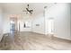 Spacious living room with tile floors and high ceilings at 10050 Hidden Dunes Ln, Orlando, FL 32832