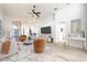 Bright and airy living room with hardwood floors and modern furnishings at 10050 Hidden Dunes Ln, Orlando, FL 32832