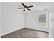 Bright bedroom featuring wood-look floors and a ceiling fan at 1104 W 3Rd Street, Sanford, FL 32771