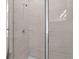 Tiled shower featuring glass door and brushed fixtures at 1123 Happy Forest Loop, Deland, FL 32720