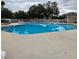 Relaxing community pool with surrounding patio at 116 Reserve Cir # 212, Oviedo, FL 32765