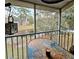 Enjoy the view from this screened porch overlooking a pond at 116 Reserve Cir # 212, Oviedo, FL 32765